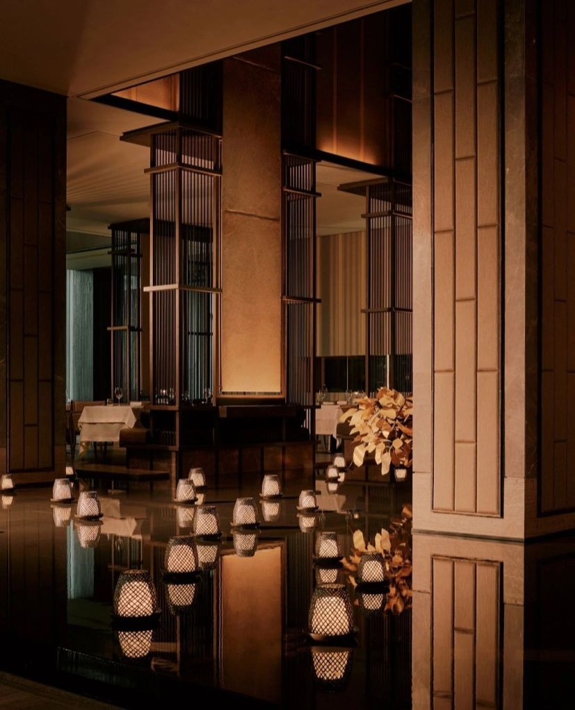 Interior view of Aman Nai Lert Bangkok featuring elegant lighting and minimalist design elements, reflecting tranquility and sophistication.