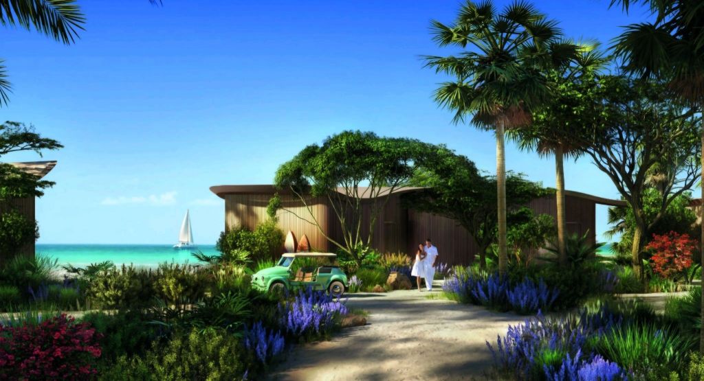 A scenic view of the Four Seasons Resort at the Red Sea, showcasing lush greenery, a pathway, and a couple walking, with the sea and a sailboat in the background.