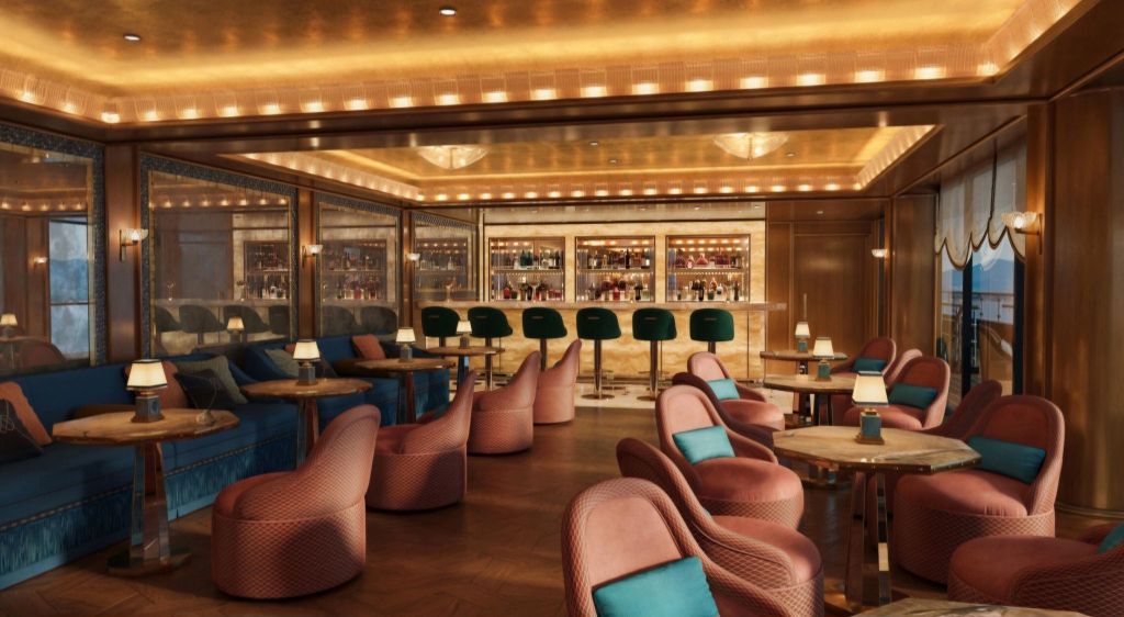 Interior view of an elegant yacht lounge with plush seating, a bar area, and a warm, luxurious ambiance.