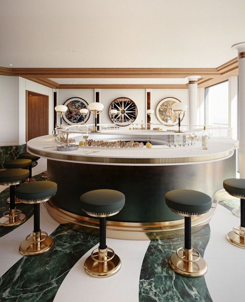 Interior view of a luxurious bar on the OE Corinthian yacht, featuring a round bar with gold and green accents, plush seating, and artistic decor on the walls.