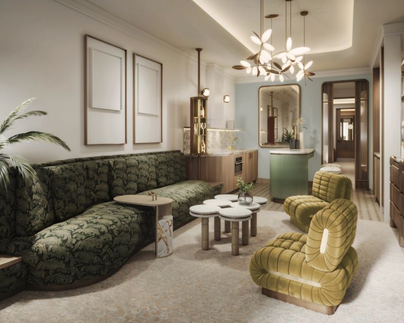 A modern interior design featuring a green, patterned sofa, stylish chairs, and a unique coffee table. The room includes a kitchen area with elegant fixtures, decorative plants, and soft lighting, creating a contemporary yet inviting atmosphere.